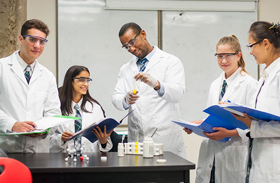 Instructor Teaching Chemistry to Students