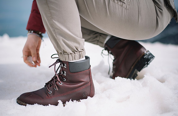 Student wearing Timberland boots in snow 