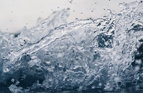 Water splashing suggesting the importance of drinking water 