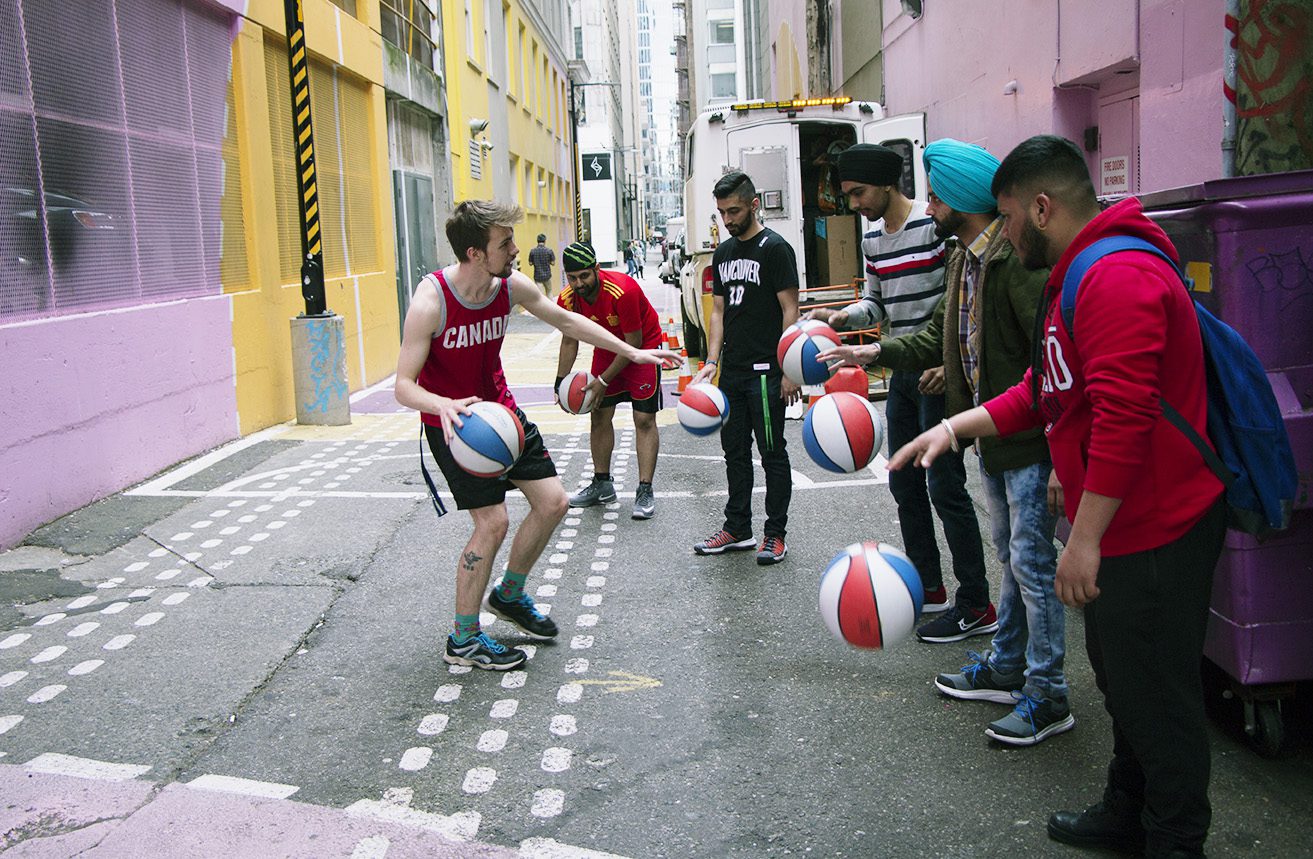 Student playing basketball after school