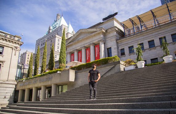person standing outside the vancouver art gallery